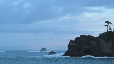Sea stacks and dramatic clouds in Izu peninsula, Shizuoka Prefecture, Japan Stock Footage 249639106