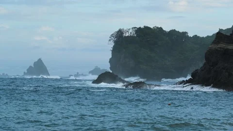 Sea stacks and dramatic clouds in Izu peninsula, Shizuoka Prefecture, Japan Stock Footage 249639112