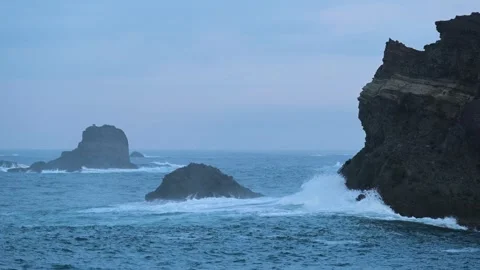 Sea stacks and dramatic clouds in Izu peninsula, Shizuoka Prefecture, Japan Stock Footage 249639115