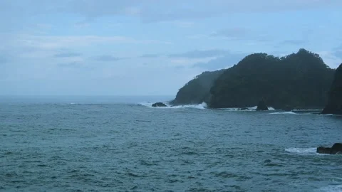Sea stacks and dramatic clouds in Izu peninsula, Shizuoka Prefecture, Japan Stock Footage 249639347