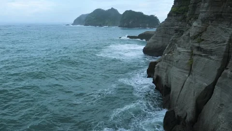Sea stacks and dramatic clouds in Izu peninsula, Shizuoka Prefecture, Japan 動画素材 249639357