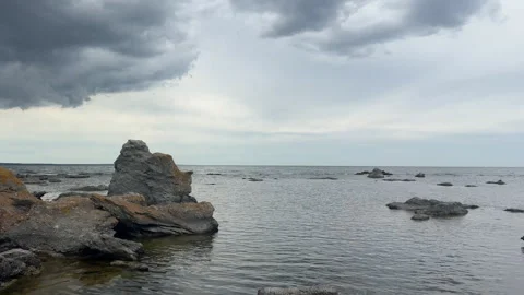 Sea Stacks and Limestone Raukar Rising from Baltic Sea Gotland Stock Footage 344612853