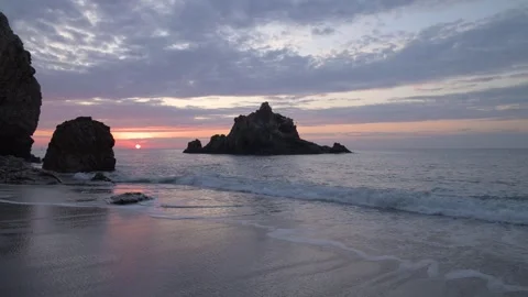 Sea stacks and waves at the beach at sunrise, Aichi, Japan Video stock 325833427