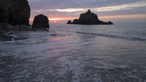Sea stacks and waves at the beach at sunrise, Aichi, Japan Stock Footage 325833430