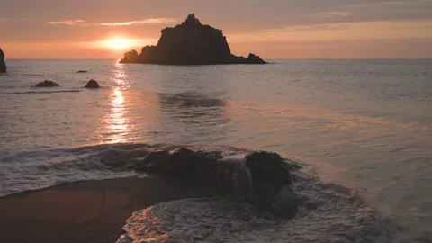 Sea stacks and waves at the beach at sunrise, Aichi, Japan Stock Footage 325833459