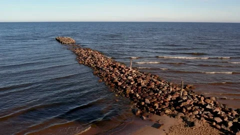 Sea with a stone pier Stock Footage 205064398