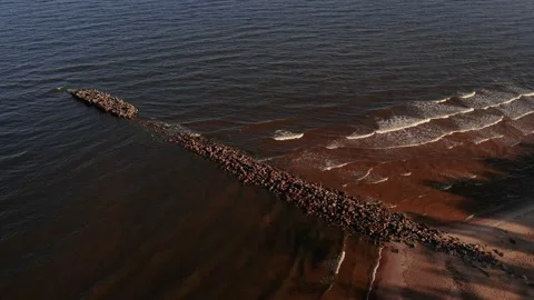 Sea with a stone pier Stock Footage 205064428