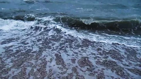 Sea storm, big waves on the sandy shore. View from the coast to the sea storm. Stock Footage 137265846