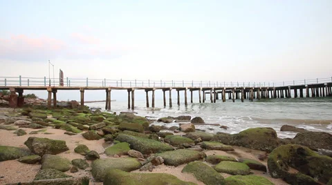 Sea storm with the jetty on evening 库存影片 34735909