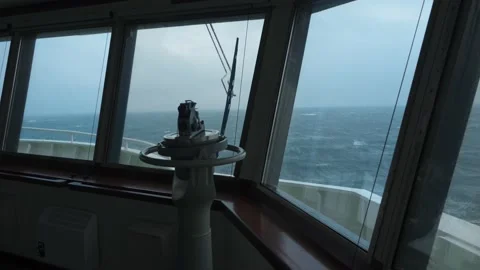 Sea Storm. Pitching. View from navigation bridge. Direction finder in foreground Stock Footage 237307794