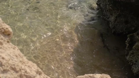 Sea storm, sea waves break on the rocks of the coast, causing an explosion of wa Stock Footage 236570852