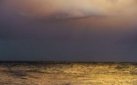 Sea with stormy clouds Stock Photos