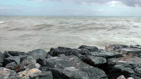 Sea stormy waves rocks breakers clouds angry Stock Footage 48624492