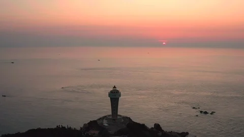 Sea sunrise lighthouse Video stock 125469482