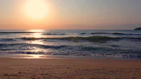 Sea sunrise over the beach with dramatic cloudscape Stock Footage 139223296