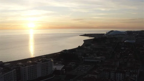 Sea sunset on the background of the city Stock Footage 134688512