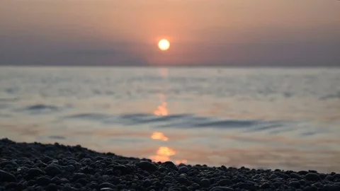 Sea at sunset in the background HD realtime footage Stock Footage 82537601