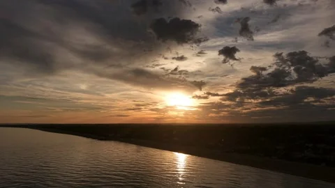 Sea Sunset With Dramatic Clouds and Golden Nature Reflection Stock Footage 341983969