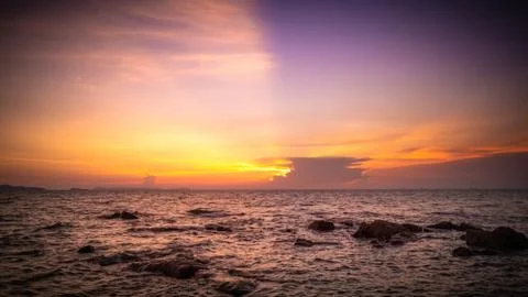 Sea sunset with dramatic clouds Stock Photos