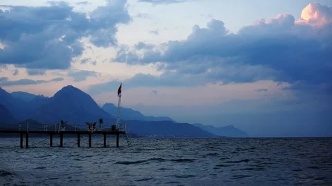 Sea sunset with mountains in the background. Turkey, Kemer. Stock Footage 107980210