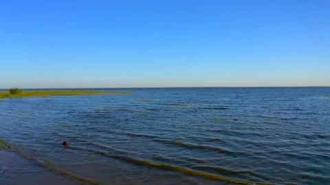 Sea at sunset. Nice view of the beach and the blue sea. Stock Footage 132088570