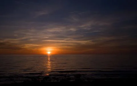 Sea sunset Stock Photos