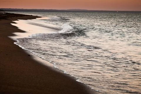 The sea with sunset Stock Photos