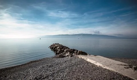 Sea at sunset Stock Photos