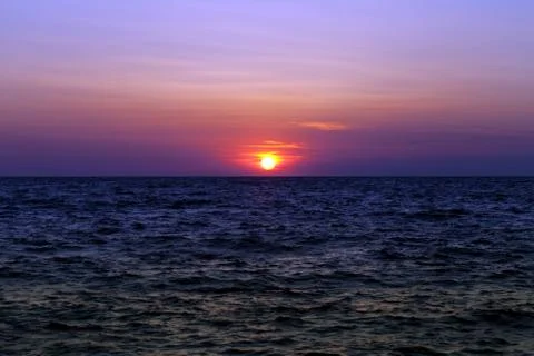 Sea at sunset Stock Photos