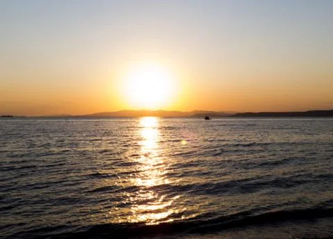 Sea at sunset Stock Photos