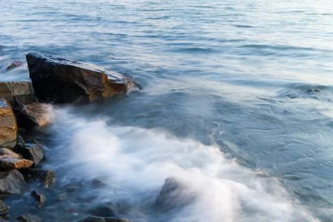Sea at sunset Stock Photos