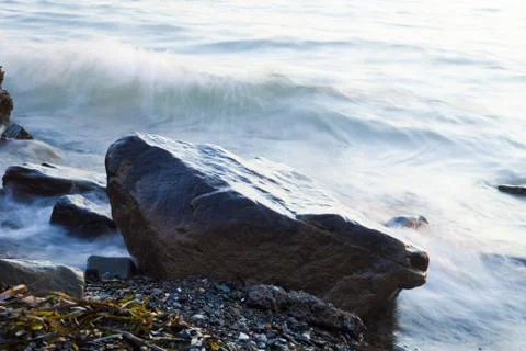 Sea at sunset Stock Photos