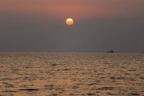 Sea at sunset Stock Photos
