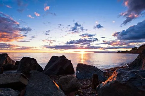 Sea at sunset, the sky is in beautiful dramatic color Foto stock