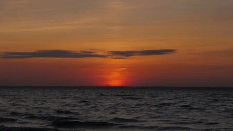 The sea at sunset. the sun goes down in the water. dark sunset Stock-Footage 104150033
