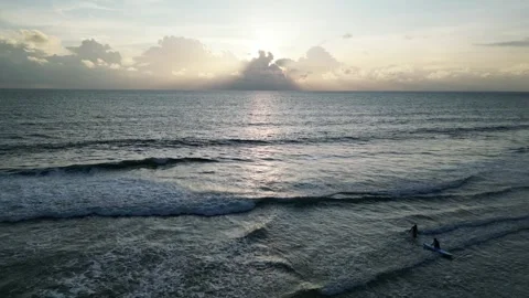 Sea sunset with surfers Video stock 297254209