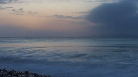 Sea sunset time lapse with many clouds on the sky Stock Footage 64795455