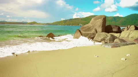 Sea surf on the beach with rocks and sand. Thailand, Phuket Vidéo 48337050