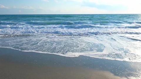 Sea surf on clear day Stock Footage 308732737