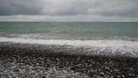 Sea surf in cloudy weather Vídeos de archivo 297475304