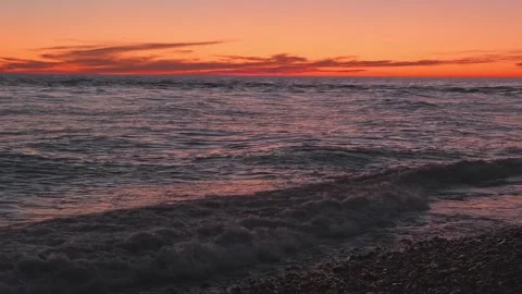 Sea surf on coast at sunset Stock Footage 330429353