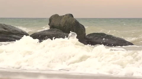 Sea surf from a low angle. Slow motion. Stock Footage 52668199