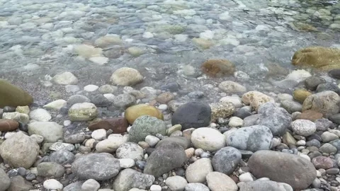Sea surf on pebble beach, close-up Stock Footage 334856518