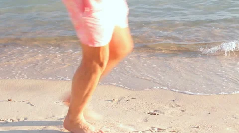 Sea surf, quiet lagoon, sandy beach, feet Stock Footage 42988015