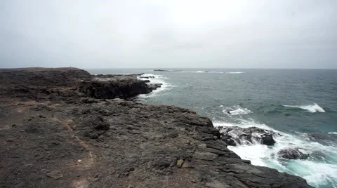 Sea surf on the rocks in the area  Punta Pesebre  on Fuerteventura 库存影片 54197752