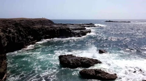 Sea surf on the rocks in the area  Punta Pesebre  on Fuerteventura Stock Footage 54654900