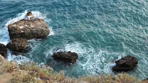 Sea surf on the rocks on the shore. Stock Footage 129200212