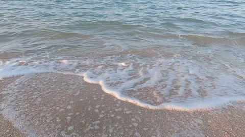 Sea surf on sandy beach, clear water, slow motion Stock-Footage 256321336