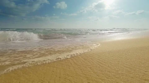 Sea surf on a sandy beach close-up Video stock 30480425