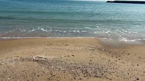 Sea surf on a sandy beach Stock Footage 302927150